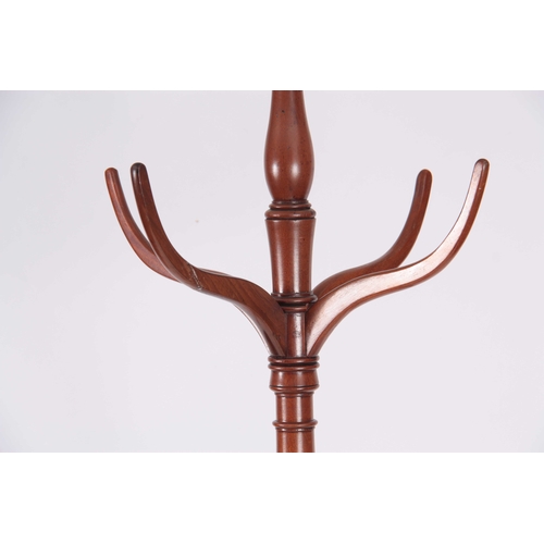 998 - A LATE GEORGIAN THREE TIER MAHOGANY COAT AND HAT STAND with curved hooks and tapering ring turned sl... 