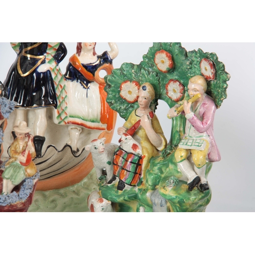 104 - A SELECTION OF FOUR 19TH CENTURY STAFFORDSHIRE FIGURE GROUPS comprising one with musicians and sheep... 