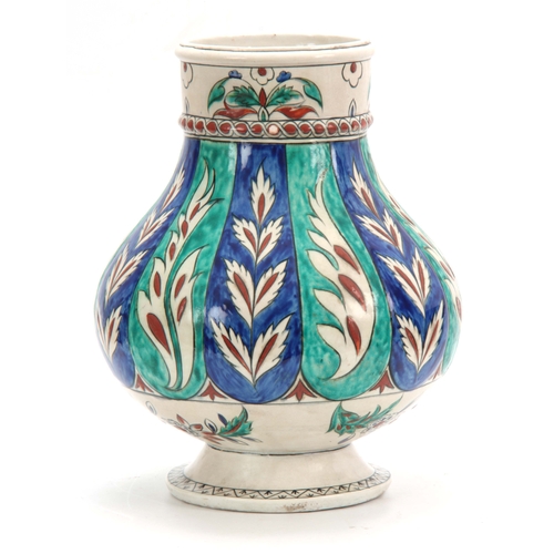 116 - A 19TH CENTURY ISNIC BALUSTER VASE decorated with brightly coloured leaf work bands 35cm high.