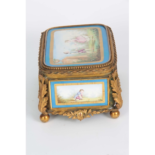 118 - A 19TH CENTURY FRENCH SEVRES STYLE PORCELAIN PANELLED AND GILT METAL MOUNTED JEWELLERY CASKET with a... 