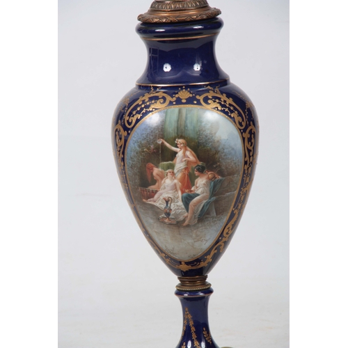 120 - AN IMPRESSIVE 19TH CENTURY ORMOLU MOUNTED SEVRES PATTERN ELECTRIFIED VASE LAMP the scrolled gilt Roy... 