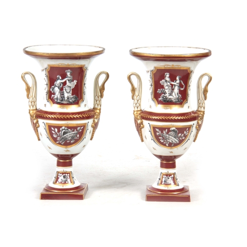 122 - A PAIR OF 19TH CENTURY PARIS HARD PORCELAIN CAMPAGNE SHAPED VASES with gilded rust panels and border... 