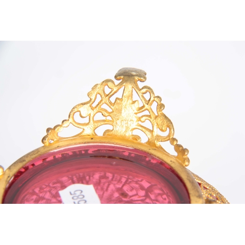 17 - A 20TH CENTURY FINELY WORKED GILT FILIGREE OVER LAID CONTINENTAL CRANBERRY GLASS BOWL with gilt serr... 