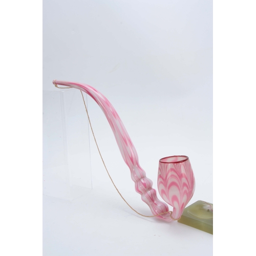 18 - A LARGE 19TH CENTURY STOURBRIDGE GLASS PIPE of twisted pink and opaque design 50cm overall.