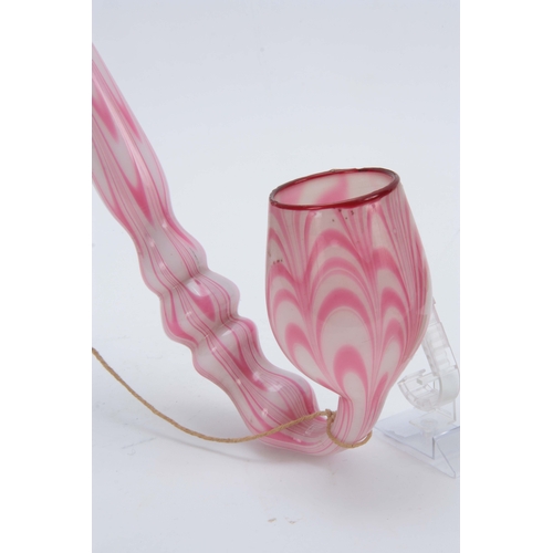 18 - A LARGE 19TH CENTURY STOURBRIDGE GLASS PIPE of twisted pink and opaque design 50cm overall.