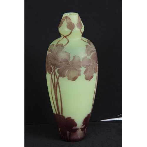 25 - AN ART NOUVEAU CAMEO GLASS VASE BY DEVEZ having a pale green ground with brown overlayed glass flora... 