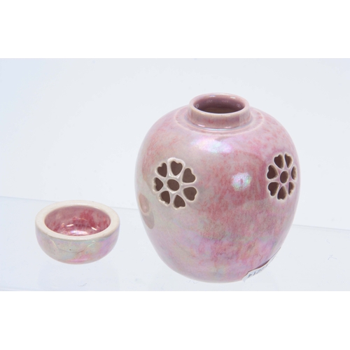 60 - AN EARLY 20TH CENTURY RUSKIN POTTERY PINK LUSTRE PIERCED MINATURE GINGER JAR AND COVER impressed mar... 