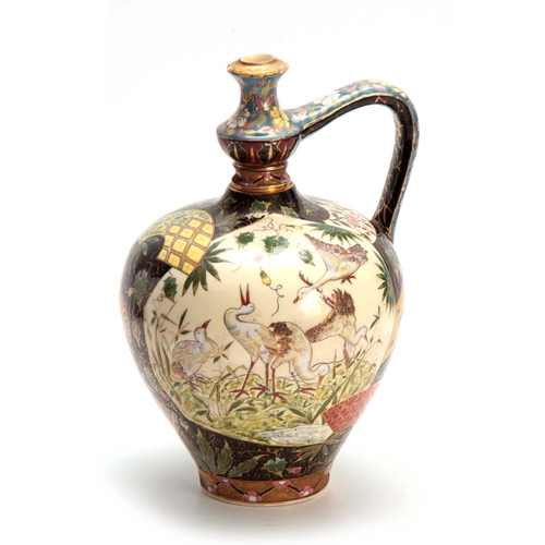 62 - AN EARLY 20TH CENTURY HUNGARIAN FISCHER BUDAPEST WATER JUG decorated with birds and floral work loze... 