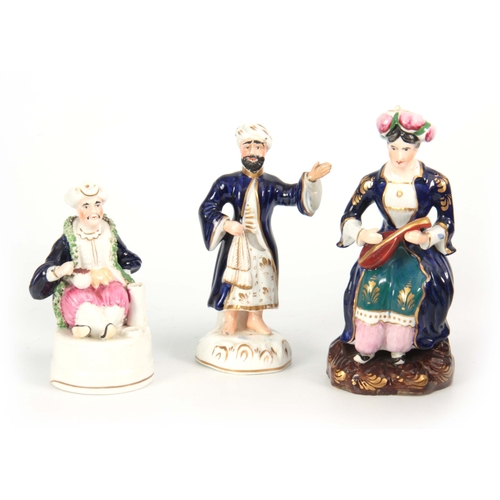 103 - A SELECTION OF THREE 19TH CENTURY STAFFORDSHIRE PORCELAIN FIGURES comprising of a Turkish lady playi... 