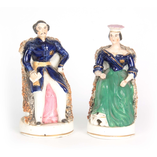 105 - A PAIR OF 19TH CENTURY STAFFORDSHIRE FIGURES depicting Victoria and Albert 17cm high.