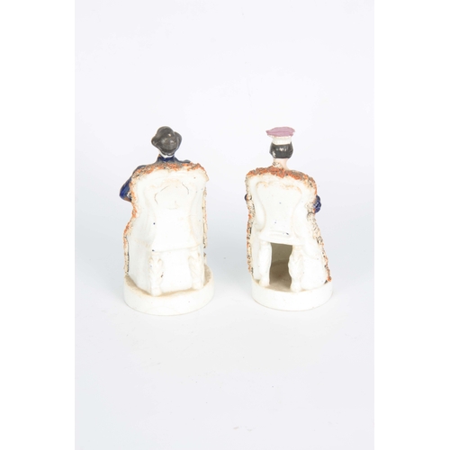 105 - A PAIR OF 19TH CENTURY STAFFORDSHIRE FIGURES depicting Victoria and Albert 17cm high.