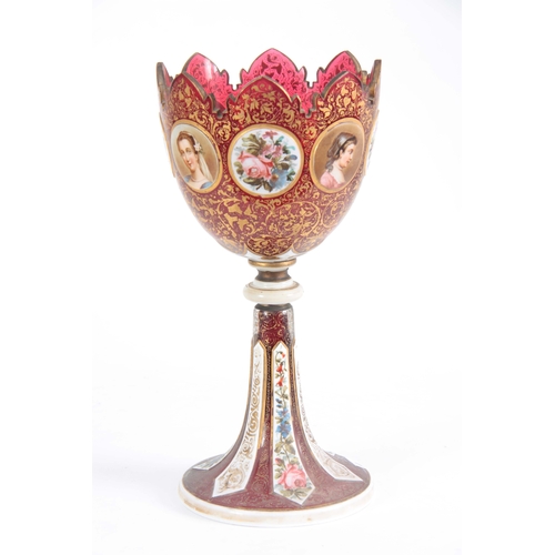 11 - A 19TH CENTURY BOHEMIAN RUBY AND WHITE OVERLAY GLASS ENAMELLED GOBLET decorated with enamelled portr... 