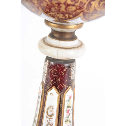 11 - A 19TH CENTURY BOHEMIAN RUBY AND WHITE OVERLAY GLASS ENAMELLED GOBLET decorated with enamelled portr... 