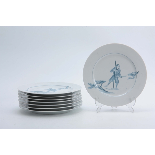 134 - A SET OF 20th CENTURY CONTINENTAL PORCELAIN BLUE AND WHITE PLATES depicting Samari warriors - signed... 