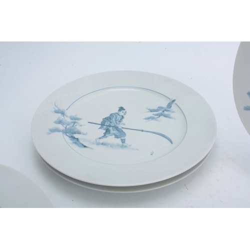 134 - A SET OF 20th CENTURY CONTINENTAL PORCELAIN BLUE AND WHITE PLATES depicting Samari warriors - signed... 