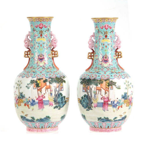 138 - A PAIR OF CHINESE REPUBLIC LATE 19TH CENTURY FAMILLE ROSE VASES decorated with continuous garden sce... 