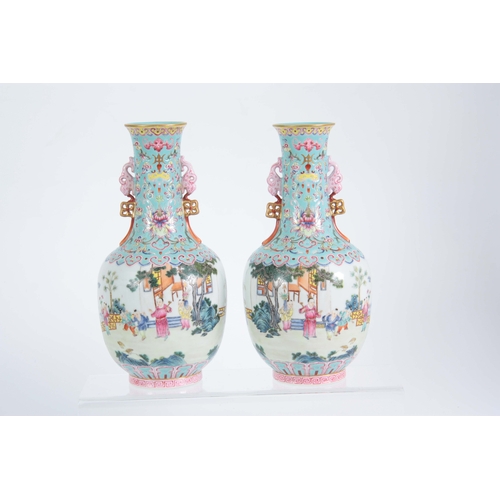 138 - A PAIR OF CHINESE REPUBLIC LATE 19TH CENTURY FAMILLE ROSE VASES decorated with continuous garden sce... 