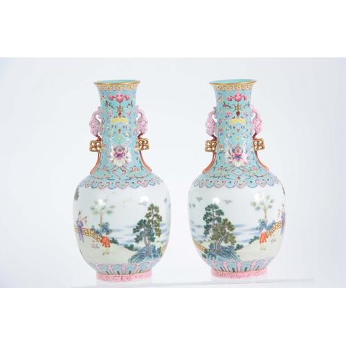 138 - A PAIR OF CHINESE REPUBLIC LATE 19TH CENTURY FAMILLE ROSE VASES decorated with continuous garden sce... 