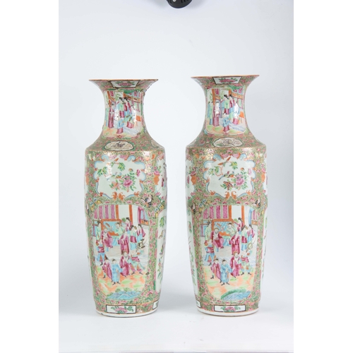 142 - A LARGE PAIR OF 19th CENTURY CHINESE CANTON VASES decorated in the Famille Rose palette depicting ma... 