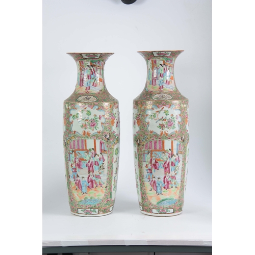 142 - A LARGE PAIR OF 19th CENTURY CHINESE CANTON VASES decorated in the Famille Rose palette depicting ma... 