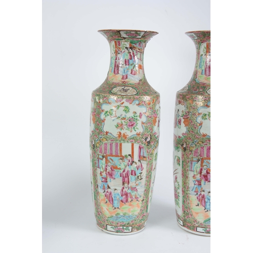 142 - A LARGE PAIR OF 19th CENTURY CHINESE CANTON VASES decorated in the Famille Rose palette depicting ma... 