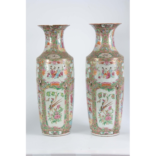 142 - A LARGE PAIR OF 19th CENTURY CHINESE CANTON VASES decorated in the Famille Rose palette depicting ma... 