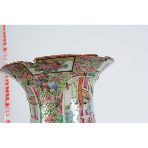 142 - A LARGE PAIR OF 19th CENTURY CHINESE CANTON VASES decorated in the Famille Rose palette depicting ma... 