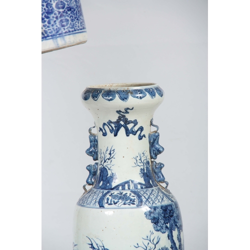 143 - A LARGE 19TH CENTURY CHINESE BLUE AND WHITE VASE having a slender neck with foo dog side handles, de... 