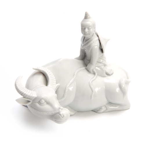 147 - A CHINESE BLANC DE CHINE FIGURE of a seated water buffalo with a young man seated on top 18cm wide 1... 