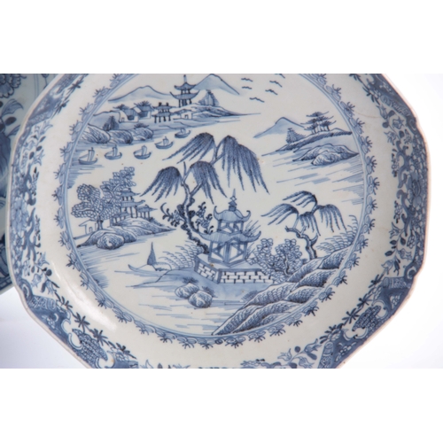 153 - AN 18TH CENTURY CHINESE BLUE AND WHITE SHALLOW DISH with fenced garden scene and butterfly centre en... 