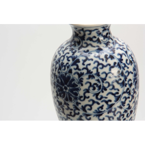 159 - A CHINESE BLUE AND WHITE VASE having floral swag decoration 23cm high.