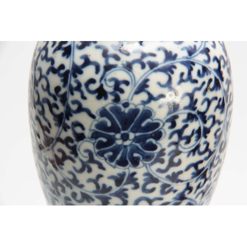 159 - A CHINESE BLUE AND WHITE VASE having floral swag decoration 23cm high.