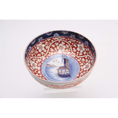 163 - AN UNUSUAL LATE 19TH CENTURY IMARI DEEP BOWL decorated in a blue palette highlighted with gilt and g... 