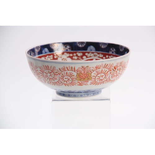 163 - AN UNUSUAL LATE 19TH CENTURY IMARI DEEP BOWL decorated in a blue palette highlighted with gilt and g... 