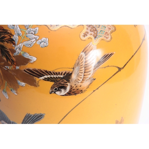 171 - A LATE 19TH CENTURY JAPANESE LARGE SHOULDERED TAPERING VASE decorated with birds, in flowering branc... 