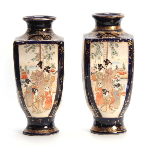 172 - A PAIR OF LATE 19TH EARLY 20TH CENTURY GILT AND ROYAL BLUE GROUND FOOTED VASES decorated with landsc... 