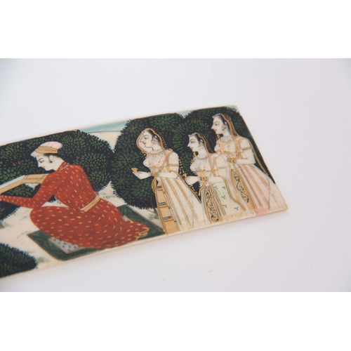 174 - A FINE 19TH CENTURY INDIAN IVORY PAINTED PLAQUE finely painted with figures hunting deer highlighted... 