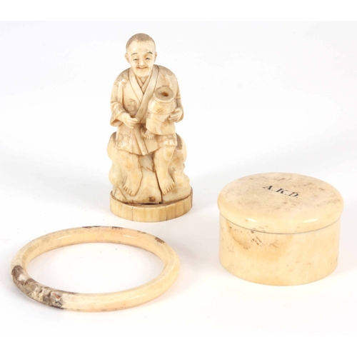 175 - A 19th CENTURY JAPANESE IVORY OKIMONO 11cm, together with a Japanese ivory bangle decorated with tig... 