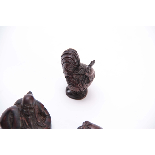 177 - A COLLECTION OF FOUR EARLY 20th CENTURY NETSUKE sculptured as various animals and figures, three wit... 