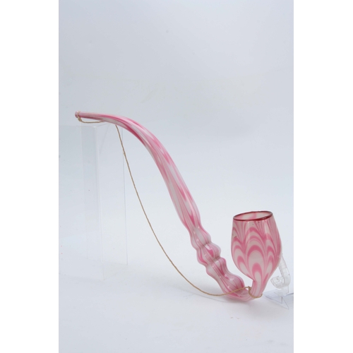 18 - A LARGE 19TH CENTURY STOURBRIDGE GLASS PIPE of twisted pink and opaque design 50cm overall.