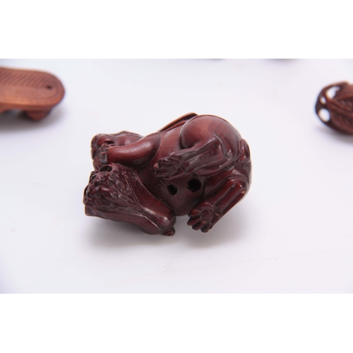 180 - A COLLECTION OF FOUR EARLY 20th CENTURY NETSUKE sculptured as various animals all with character mar... 