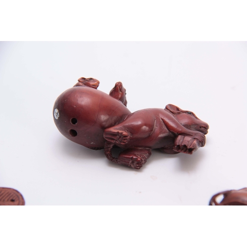 180 - A COLLECTION OF FOUR EARLY 20th CENTURY NETSUKE sculptured as various animals all with character mar... 