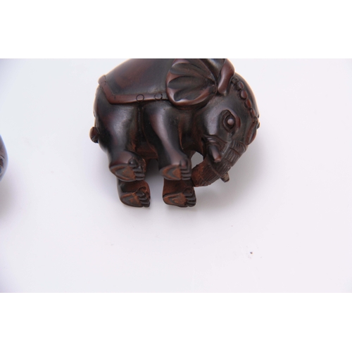 181 - A COLLECTION OF FOUR EARLY 20th CENTURY NETSUKE sculptured as various animals three with character m... 