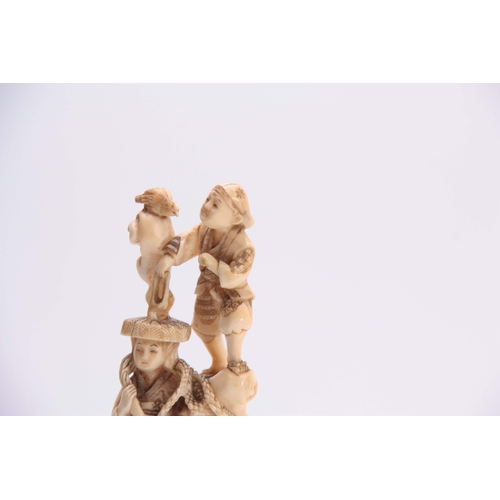 187 - A GOOD 19TH CENTURY JAPANESE CARVED IVORY TOWER FIGURE finely detailed with engraved decoration on a... 