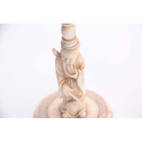 187 - A GOOD 19TH CENTURY JAPANESE CARVED IVORY TOWER FIGURE finely detailed with engraved decoration on a... 