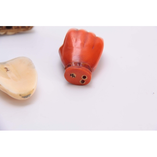 189 - A COLLECTION OF FOUR EARLY 20th CENTURY IVORY NETSUKE three with character marks (4)