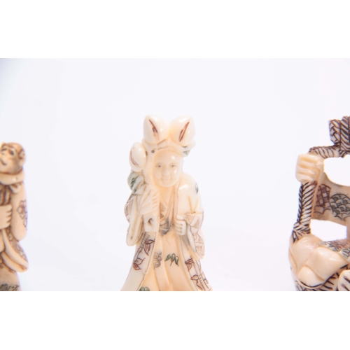 190 - A COLLECTION OF FOUR EARLY 20th CENTURY IVORY NETSUKE sculptured as various figures all with charact... 