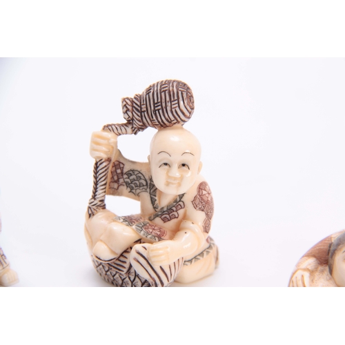 190 - A COLLECTION OF FOUR EARLY 20th CENTURY IVORY NETSUKE sculptured as various figures all with charact... 