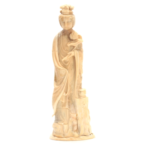 197 - A LATE 19th CENTURY CHINESE IVORY SCULPTURE modelled as Guanyin with buddha crown 24.5cm high