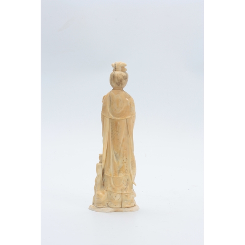 197 - A LATE 19th CENTURY CHINESE IVORY SCULPTURE modelled as Guanyin with buddha crown 24.5cm high